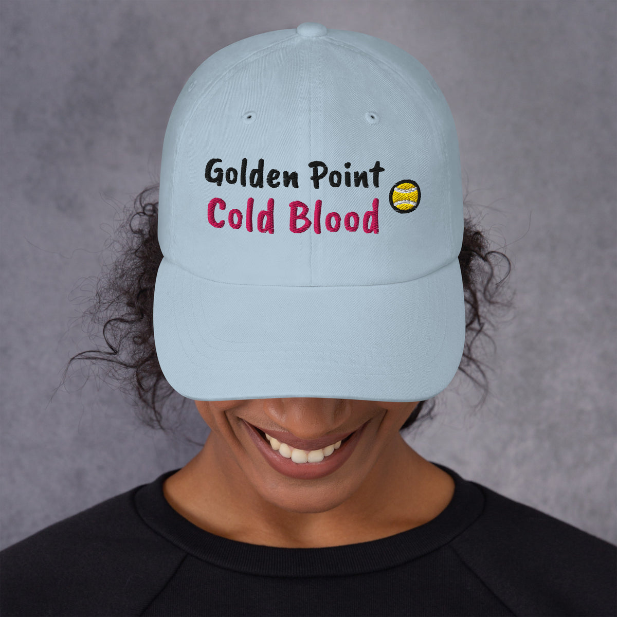 Ocean blue padel dad cap with the Golden Point design embroidered on the front, front view