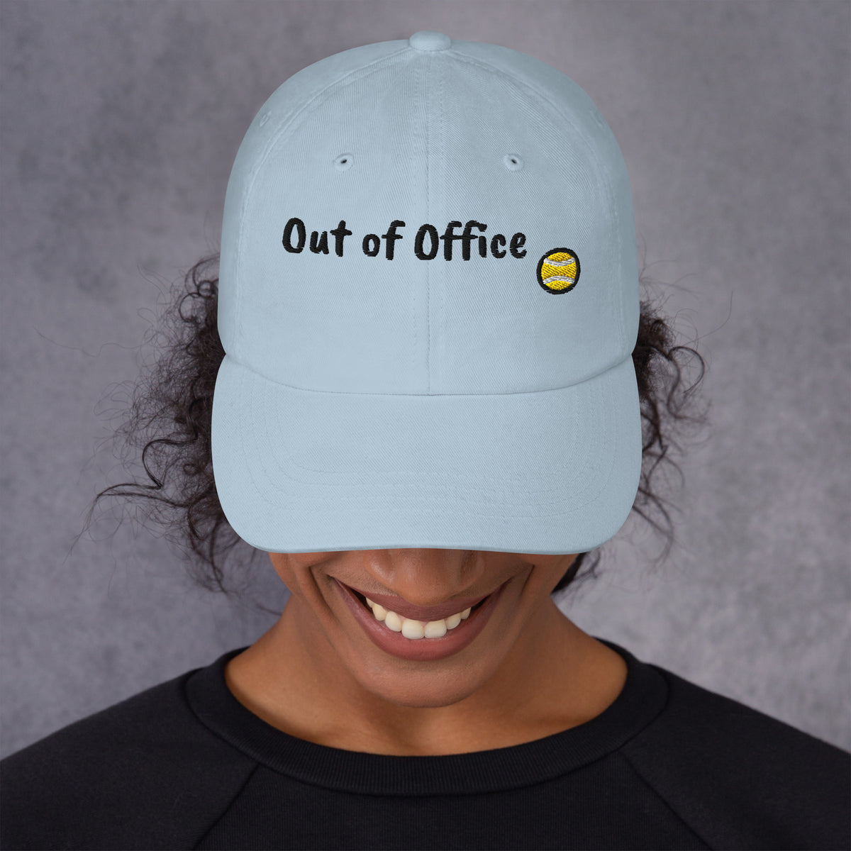 Ocean blue padel dad cap with the Out of Office design embroidered on the front, front view