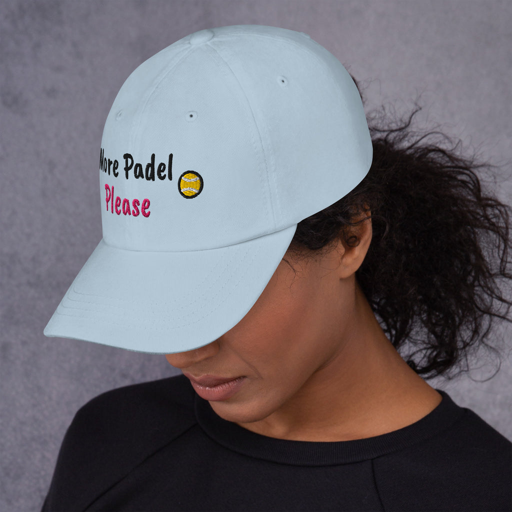 Ocean blue padel dad cap with the More Padel Please design embroidered on the front, left side view