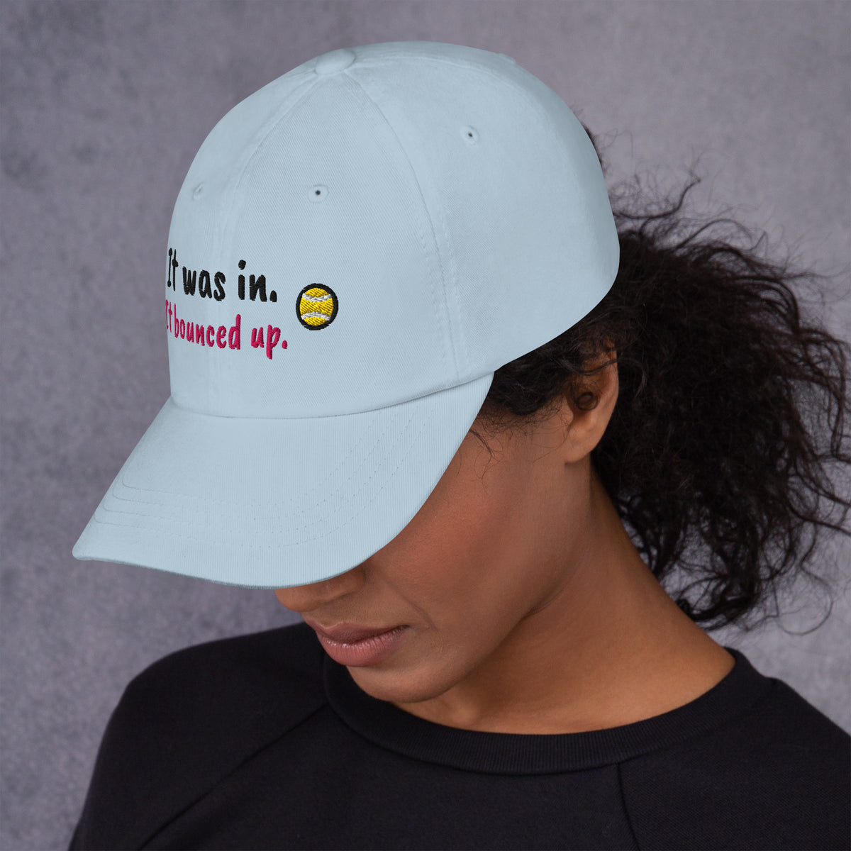 Ocean blue padel dad cap with the It Was In design embroidered on the front, left side view