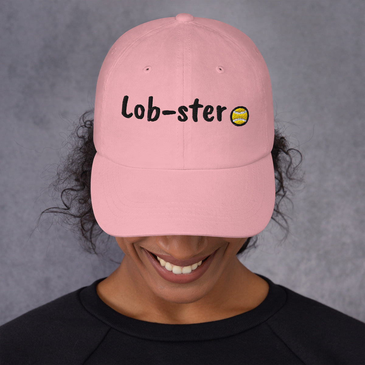 Pink padel dad cap with the Lob-ster design embroidered on the front, front view