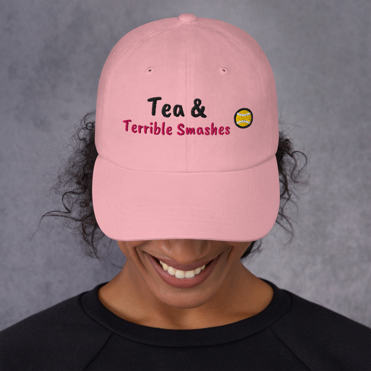 Pink padel dad cap with the Tea & Terrible Smashes design embroidered on the front, front view