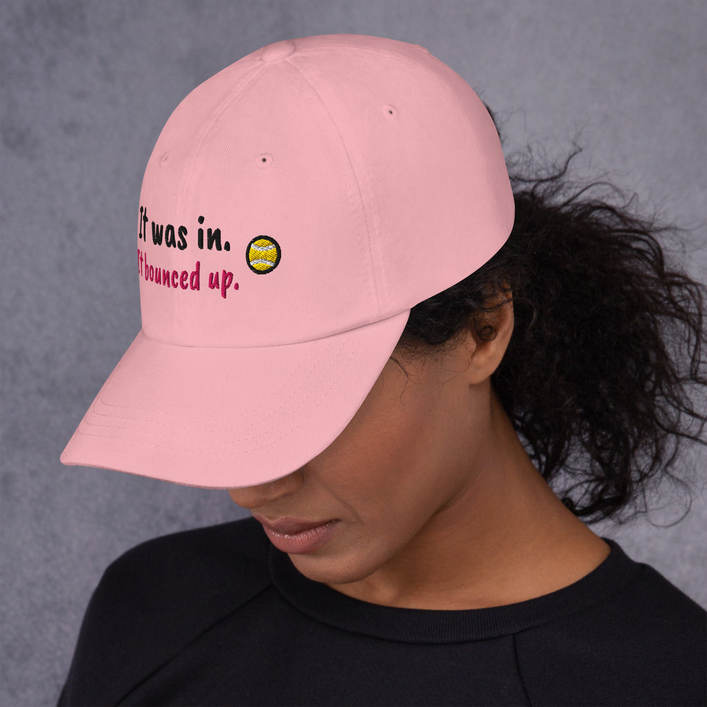Pink padel dad cap with the It Was In design embroidered on the front, left side view