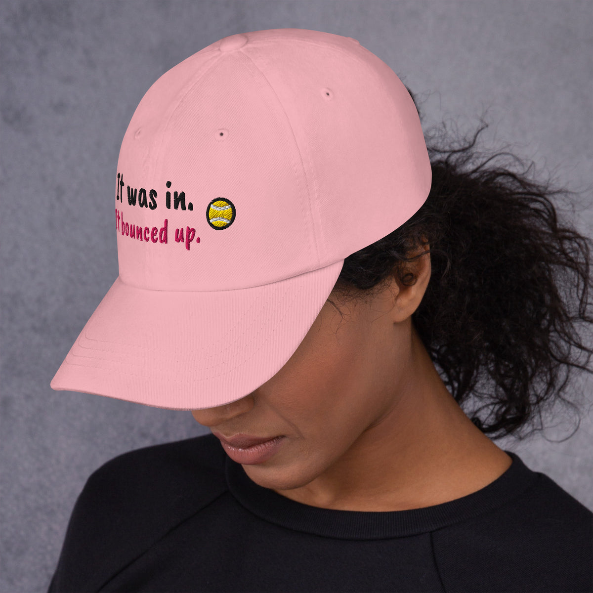 Pink padel dad cap with the It Was In design embroidered on the front, left side view