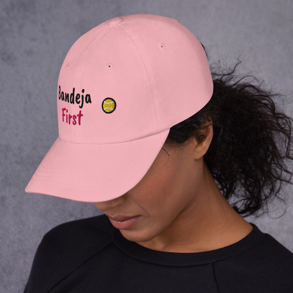 Pink padel dad cap with the Bandeja First design embroidered on the front, left side view