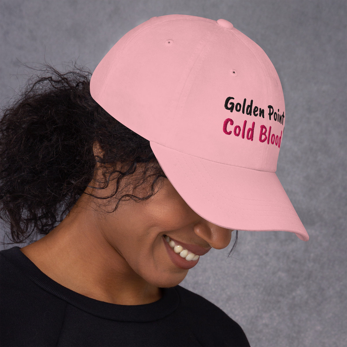 Pink padel dad cap with the Golden Point design embroidered on the front, right side view