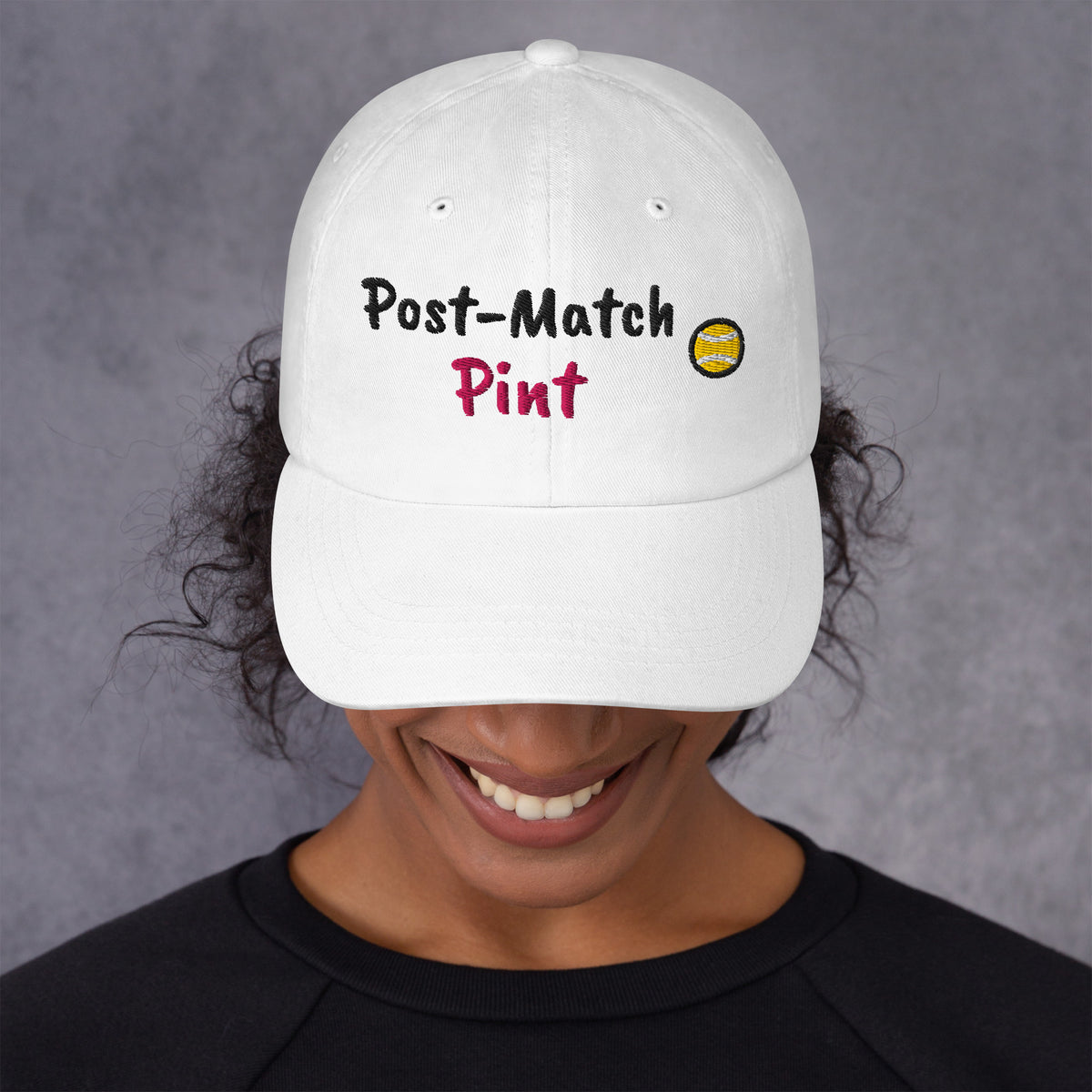 White padel dad cap with the Post-Match Pint design embroidered on the front, front view
