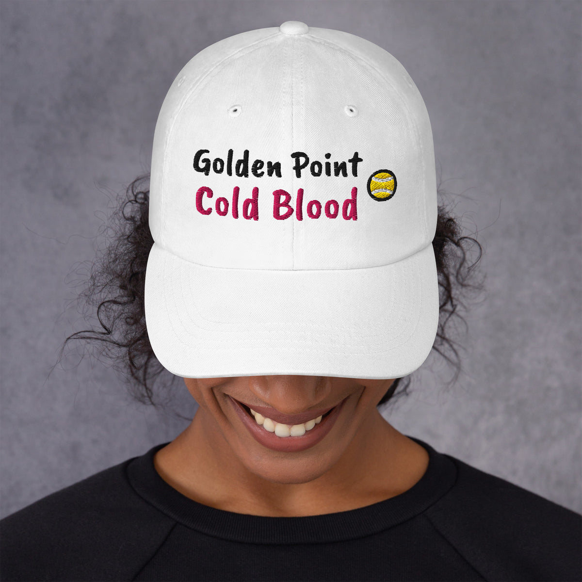 White padel dad cap with the Golden Point design embroidered on the front, front view