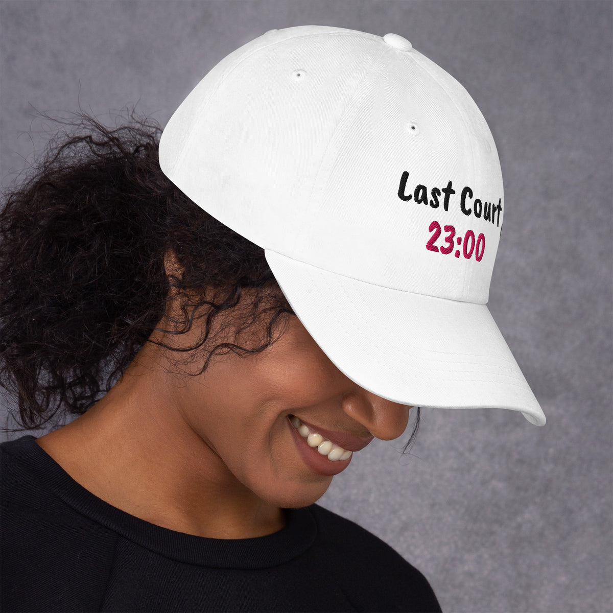 White padel dad cap with the Last Court 23:00 design embroidered on the front, right side view