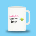 White 11 oz padel mug with the slogan “Bandeja first, questions later”
