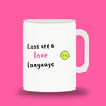 White 11 oz padel mug with the slogan “Lobs are a love language”